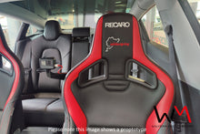 Load image into Gallery viewer, LHD Wilvern Motorsport GoPro mount for Recaro Sportster CS Seat with GoPro and charging cable shown from front fitted to an Atomic Nurburgring edition seat in a Tesla Model 3